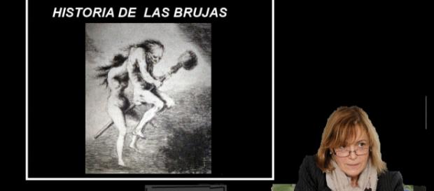 una profesora de la facultad dando una conferencia una profesora de la facultad dando una conferencia