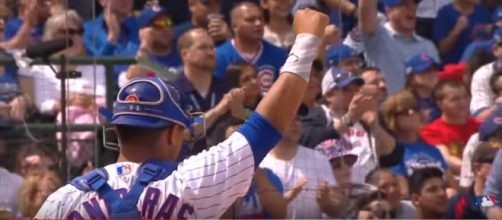 Willson Contreras was one of the Cubs told he was in violation of uniform policy, for wearing a flag on his uniform. [image source: MLB/YouTube]
