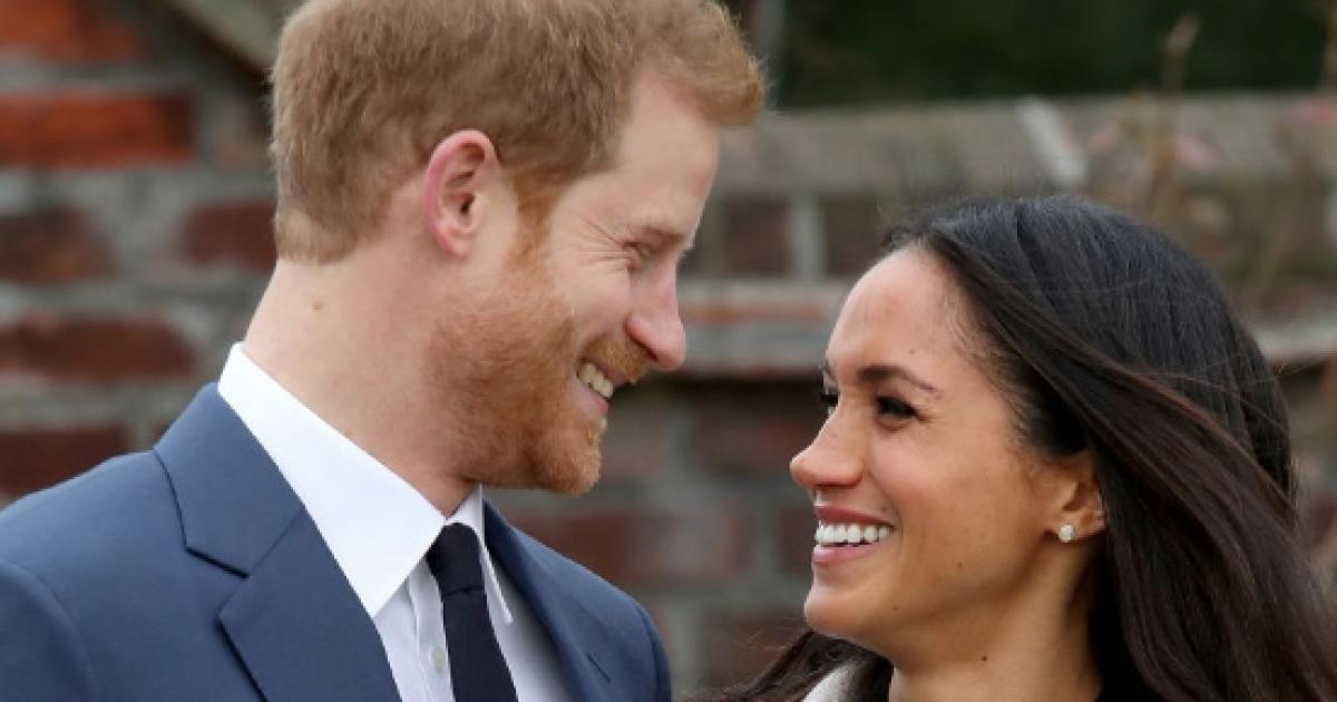 Emmanuel Macron giving Prince Harry a ‘James Bond cigarette lighter ...