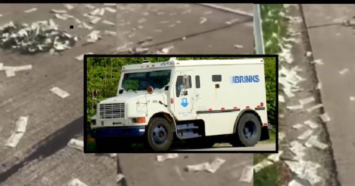 Armored truck spills cash on highway Freeforall as passersby scoop(01)