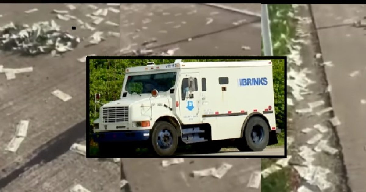 Armored truck spills cash on highway Freeforall as passersby scoop