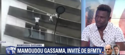 Mr Gassama quickly climbed up, pulling the child safely onto the fourth-floor balcony. image - BFMTV, Youtube
