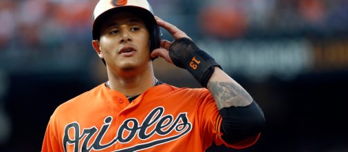 Should the Cubs trade Addison Russell for Manny Machado? [Image via nbcsports.com/YouTube]