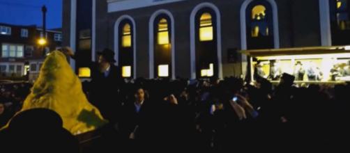 As the Lag Ba'Omer fire was lit during celebrations in northern London, an explosion injured 30 people. [Image YWN/YouTube]