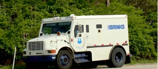 Brinks truck spills money and cops want you to give it back. Photo: NewZZCafe/YouTube screenshot