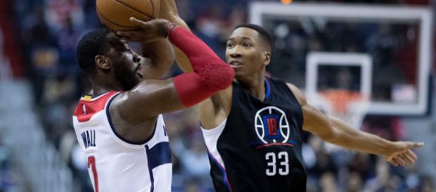 Wesley Johnson opted in to remain with the Clippers next season. Image Source: Flickr | Keith Allison Wesley Johnson opted in to remain with the Clippers next season. Image Source: Flickr | Keith Allison