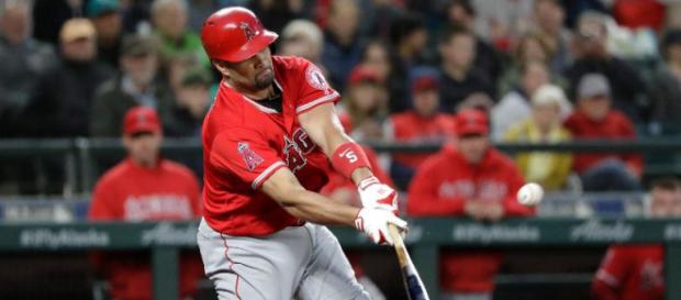 Albert Pujols hizo historia el viernes en Safeco Field en Seattle. MLB.com. Albert Pujols hizo historia el viernes en Safeco Field en Seattle. MLB.com.