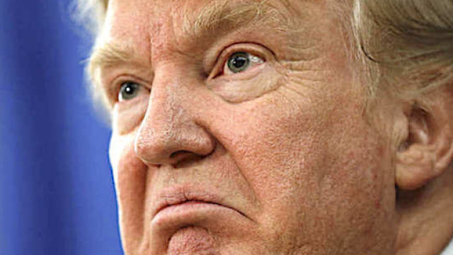 In alto, il presidente Donald Trump