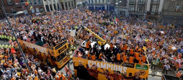 Wolves celebrate their Championship victory with an open-top bus parade through the city. Credit: @DarrenProsser/Twitter. Wolves celebrate their Championship victory with an open-top bus parade through the city. Credit: @DarrenProsser/Twitter.