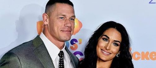 John Cena and Nikki Bella called off their wedding but might still be seeing each other [Image: Entertainment Tonight/YouTube screenshot]