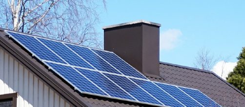 Solar panels on a home (Image by Tiia Monto via Wikimedia Commons)
