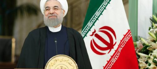 In alto, il presidente iraniano Rohani