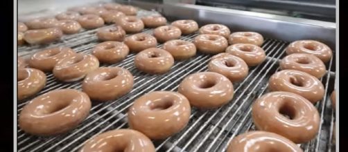 Free donuts are being given out for National Doughnut Day. [image source: Insider - YouTube]