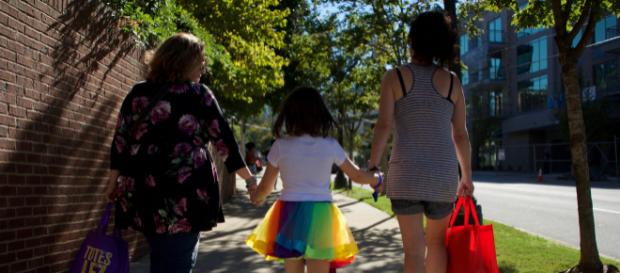 A modern family walking away from a gay festival in Atlanta. (Image via Tom Driggers / Flickr) A modern family walking away from a gay festival in Atlanta. (Image via Tom Driggers / Flickr)