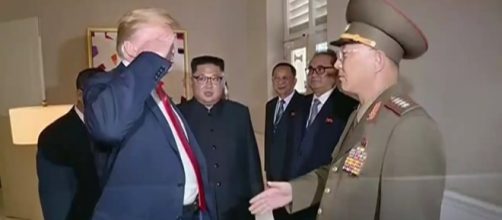 Trump faces major backlash when Trump returns a salute to North Korean general at the summit in Singapore. [Image source: ABCNews/YouTube]