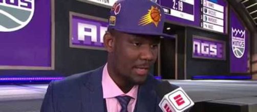 The Phoenix Suns' DeAndre Ayton leads the early odds to win next season's NBA Rookie of the Year award. - [Image via NBA / YouTube screencap]