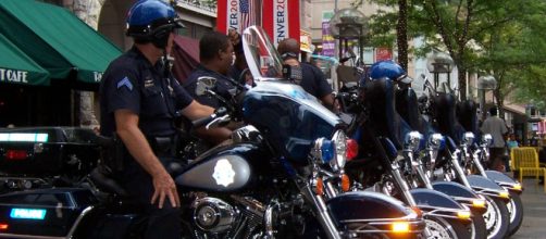 Denver police officers on motorcycles [Image source: Regroce - WikiMedia Commons]