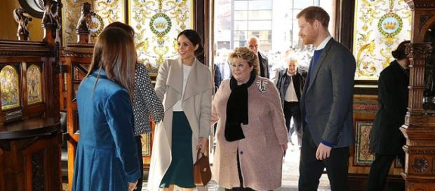 Prince Harry and Ms. Markle visit Belfast’s Crown Liquor Saloon (Image courtesy – Northern Ireland Office, Wikimedia Commons) Prince Harry and Ms. Markle visit Belfast’s Crown Liquor Saloon (Image courtesy – Northern Ireland Office, Wikimedia Commons)
