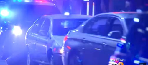 Cops engage in a bizarre slow speed chase through Los Angeles. [image source: CBS Los Angeles - YouTube]