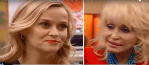 Reese Witherspoon and Dolly Parton share a few sequins and appreciation for Whitney Houston during interview. - [Joong Kim / YouTube screencap]