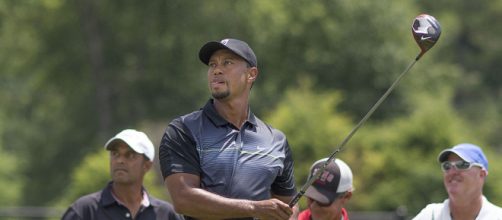 Tiger Woods practices on the driving range in Bethesda, Maryland (Image courtesy – Keith Allison, Wikimedia Commons)