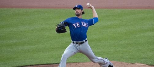 Cole Hamels was acquired by the Cubs on Thursday. [Image Source: Keith Allison - Flickr]