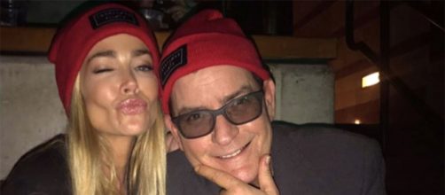 Denise Richards poses with her ex-husband Charlie Sheen at a concert. [Photo via Instagram]