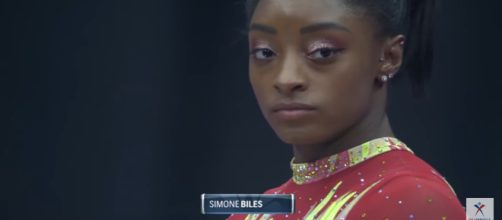Simone Biles competes at the 2018 US Classic. - [USAGymnastics / YouTube screencap]