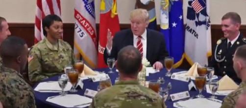 Donald Trump discussing military parade with officers. [Image courtesy – YouTube, Time]