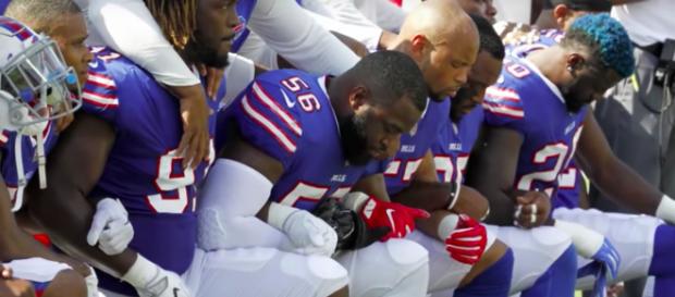 The NFL is working with the players association to come up with a new national anthem policy. (image source: CBS Evening News/YouTube) The NFL is working with the players association to come up with a new national anthem policy. (image source: CBS Evening News/YouTube)