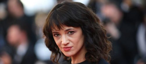 Asia Argento in bed with underage co-star (Image via RT.com/Twitter)