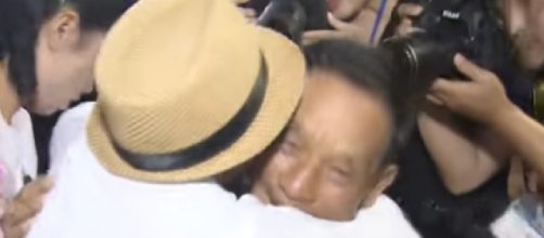 Tears of joy: North & South Korean families separated over 6 decades ago reunite. [Image courtesy – RT, YouTube video]