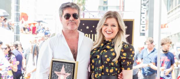 Kelly Clarkson Honors Simon Cowell as He Gets His Hollywood Star ... - (Image via standard.co.uk/Twitter) Kelly Clarkson Honors Simon Cowell as He Gets His Hollywood Star ... - (Image via standard.co.uk/Twitter)