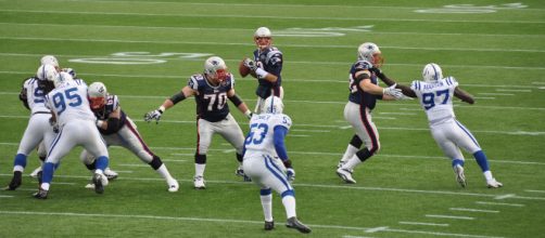File:Tom Brady and his offensive line.jpg - (Image via fantasy football/Wikimedia Commons - wikimedia.org)