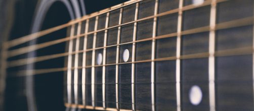 A guitar, much like the ones used for many country songs. [Image Source: Ana_J - Pixabay]