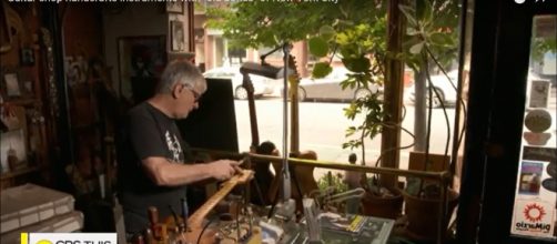 Rick Kelly of Carmine Street Guitars repurposes wood of NewYork's history into guitars for stellar artists. [Image source:CBSThisMorning-YouTube]