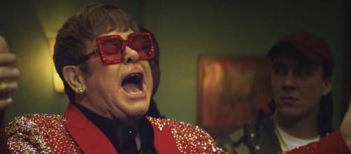 Rumours are going around that Elton John will appear in the John Lewis Christmas advert for 2018. [Image Snickers UK/YouTube]