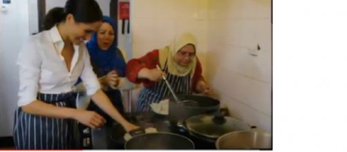 Meghan Markle makes secret visits to Grenfell to make cookbook and she’s in the kitchen. [Image courtesy- Star magazine YouTube video]