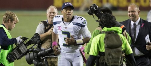 Russell Wilson was under siege all night in their 17-10 Week 2 loss to the Bears. [Image source: Keith Allison - Flckr]