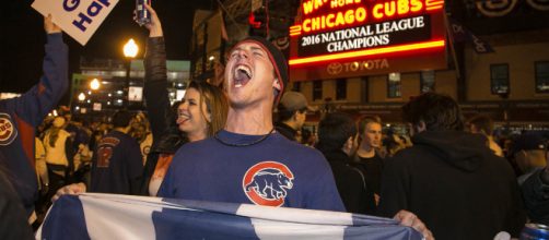 Chicago Cubs fans want to celebrate but the team is holding off. [Image source: nypost - YouTube]