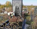 Grieving father erects tombstone for daughter as a 5ft iPhone