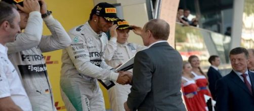Lewis Hamilton receives his Russian Grand Prix trophy from President Vladimir Putin - Image - Kremlin Ru | Wikimedia