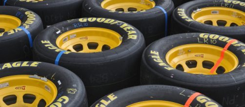 A group of NASCAR racing tires. [Image via artbyrandy - Pixabay]