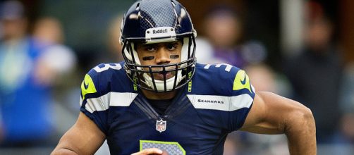 Russell Wilson will have to carry his team on his back for the Seahawks to succeed. [image source: Larry Maurer- Wikimedia Commons]