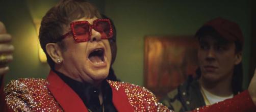 Elton John has announced the UK dates for his "Farewell Yellow Brick Road" world tour. [Image Snickers UK/YouTube]