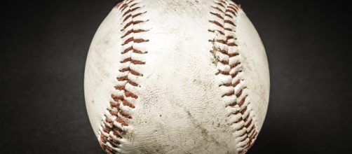 A close-up view of a baseball. [Image Source: Free-Photos - Pixabay]