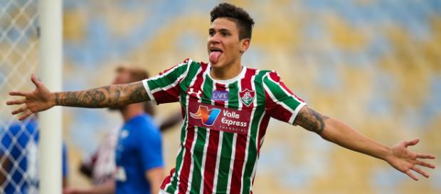 El delantero de 21 años juega en el Fluminense; podría aceptar su salida por una cantidad cercana a los 25 millones de euros El delantero de 21 años juega en el Fluminense; podría aceptar su salida por una cantidad cercana a los 25 millones de euros
