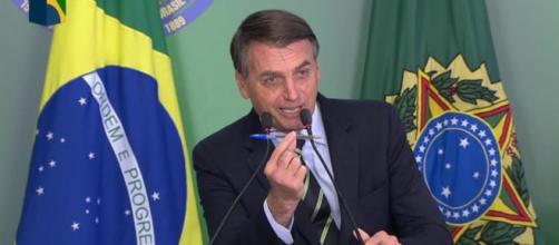 Bolsonaro assina decreto para facilitar posse de arma (Reprodução/G1)