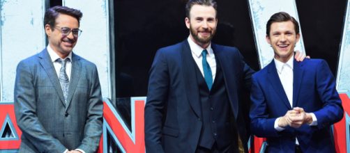 Chris Evans y Tom Holland en la presentación de 'The Devil All The Time' Will ... - bustle.com