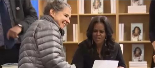 Adults, children line up to meet Michelle Obama on her 'Becoming' book tour in Chicago. [Image source/Global News YouTube video]